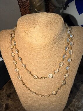 Long crystal gold tone necklace can be worn different ways
